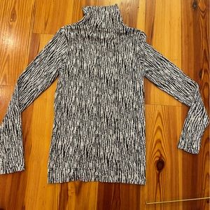 Athleta black and white flurry turtleneck.  L